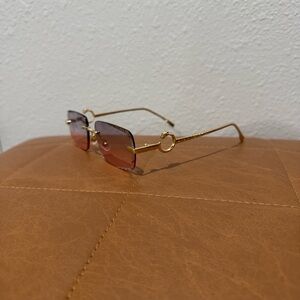 BRAND NEW: Cartier Gold Frame Pink Gradient Rimless Sunglasses